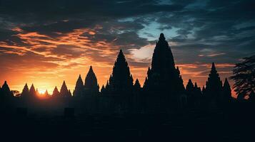 flou image de prambanan temple à le coucher du soleil avec bruit et grain. silhouette concept photo