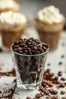 café des haricots dans une verre tasse et dans le Contexte une tasse avec café et fouetté crème photo