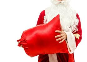 Père Noël claus en portant une cadeaux contre blanc Contexte photo