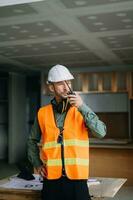 Beau homme équipe architecte sur une bâtiment industrie construction site photo