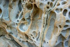 Contexte et texture de Montagne couches et des fissures dans sédimentaire falaise de Roche Montagne. photo