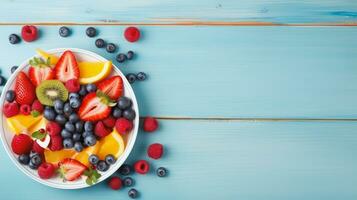 Haut vue de fruit salade avec fraise et myrtille sucré Cerise dans assiette sur bois bleu arrière-plan, ai génératif. photo