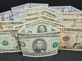 économie et finance avec de l'argent en dollars américains photo