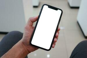 téléphone, en portant téléphone blanc filtrer, en utilisant mobile téléphone photo