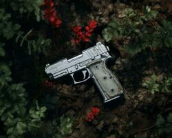 une pistolet pose sur le sol entouré par rouge fleurs génératif ai photo