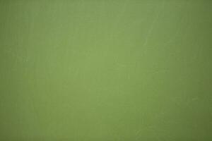 le texture de le vert école planche avec petit rayures et puces. photo