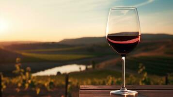 fermer de verre de rouge du vin reflétant vignoble paysage offre serein ambiance ai génératif photo