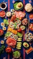 un international le banquet de au-dessus de, une unificateur propager de Sushi, Pâtes, et tacos sur une vibrant nappe de table ai génératif photo