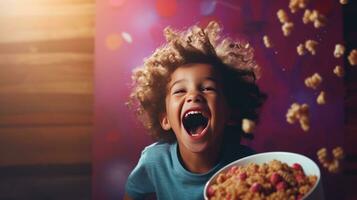 une enfant en riant à côté de une bol de céréale photo