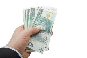 banquier main en portant polonais 100 pln billets de banque photo