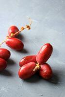 rouge données Jeune paume fruit photo