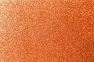 fond de texture de paillettes orange photo