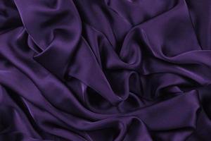 la texture du tissu de luxe en soie ou en satin peut être utilisée comme arrière-plan abstrait. vue de dessus.