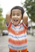 proche en haut tête de asiatique les enfants bonheur émotion photo