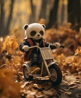 une mignonne Panda sur une mini-vélo équitation par une forêt photo