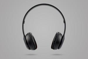 écouteurs sans fil de couleur noire isolés sur fond pastel de couleur grise photo