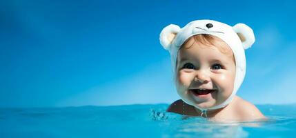 une enfant prise premier nager leçon isolé sur une bleu pente Contexte photo