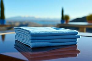 harmonieux teintes bleu un gant de toilette sur table contre bleu ciel calme et unifié ai généré photo