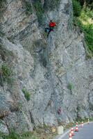 grimpeur placement sécurité filets à éviter chute rochers photo