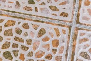 belle pierre de mur et motif de texture de sol ou de sol mexique. photo