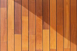 texture de fond de lambris en bois. Ipé teck bois tropical sur façade de bâtiment photo
