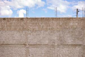 mur fabriqué de céramique bloquer briques avec éclaboussé ciment photo
