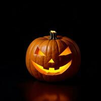 citrouille d'halloween sur fond noir photo