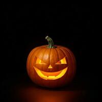 citrouille d'halloween sur fond noir photo