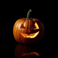 citrouille d'halloween sur fond noir photo