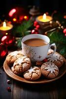 Noël biscuits. délicieux traite, de fête décorations, et une tasse de cacao photo