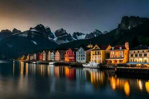 coloré Maisons ligne le l'eau à nuit dans de face de montagnes. généré par ai photo