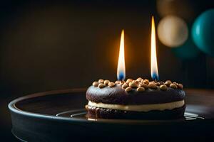 une Chocolat gâteau avec deux brûlant bougies sur Haut. généré par ai photo