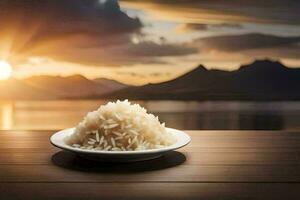 une bol de riz sur une table dans de face de une le coucher du soleil. généré par ai photo