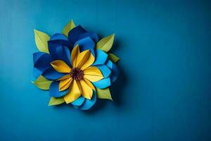 une bleu et Jaune papier fleur sur une bleu mur. généré par ai photo