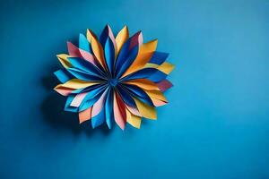 une coloré fleur fabriqué en dehors de papier sur une bleu mur. généré par ai photo