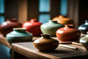 une groupe de coloré des vases séance sur une tableau. généré par ai photo