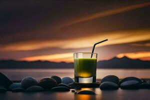 une verre de jus avec rochers et une le coucher du soleil dans le Contexte. généré par ai photo