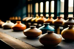 une rangée de coloré des vases asseoir sur une tableau. généré par ai photo