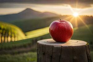 un Pomme est assis sur Haut de une souche dans de face de une le coucher du soleil. généré par ai photo