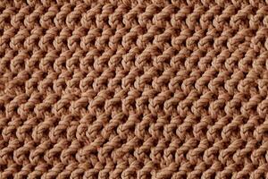 Contexte avec tricoté modèle. texture de la laine en tissu photo