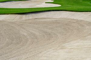 le golf cours le sable fosse bunker esthétique arrière-plan,utilisé comme obstacles pour le golf compétitions pour difficulté et chute de le cours pour beauté photo