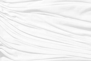 Haut vue abstrait blanc tissu Contexte avec doux vagues.vague et courbe chevauchement avec différent ombre de Couleur blanche tissu, froissé tissu. photo