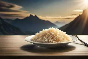 une assiette de riz avec une fourchette et couteau sur une table dans de face de une Montagne. généré par ai photo