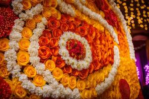 une grand fleur mur décoré avec Orange et blanc fleurs. généré par ai photo