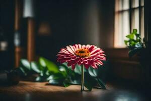 une Célibataire rose fleur est assis sur une en bois tableau. généré par ai photo