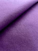 fond de tissu plié de texture de toile de couleur violette photo