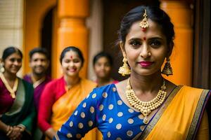 une femme dans une sari pose avec sa famille. généré par ai photo