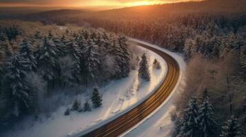 aérien vue de courbée venteux route dans neige couvert forêt. génératif ai photo