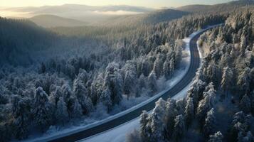 aérien vue de venteux et courbée route dans neige couvert forêt paysage. génératif ai photo