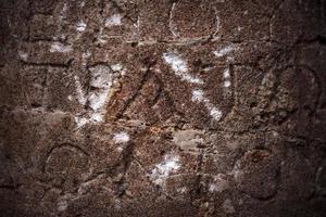 Épigraphe historique de l'âge antique sur la pierre de tablette de marbre photo